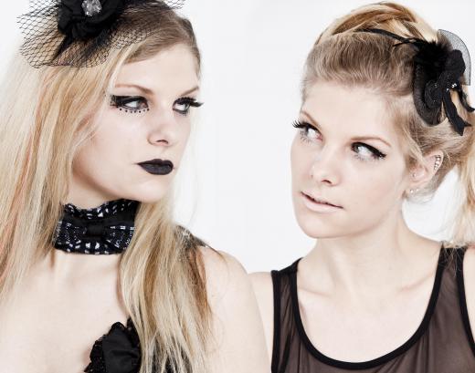 Goth fashion includes clothes that are black or dark-colored clothes that are paired with goth-style accessories and makeup.