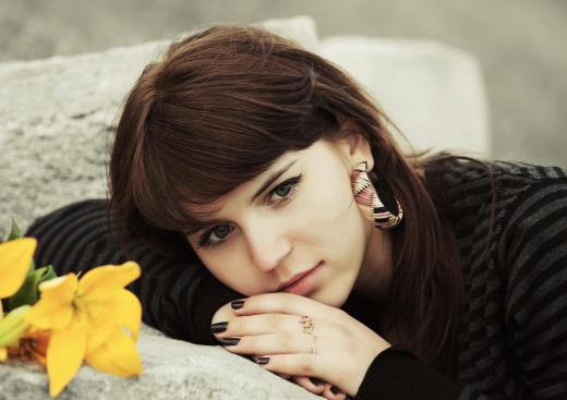 Stylized senior portraits for high school students are a type of glamour photography.