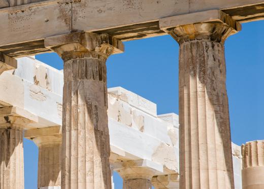 A Doric capital is a simple rectangular structure set on top of a round column.