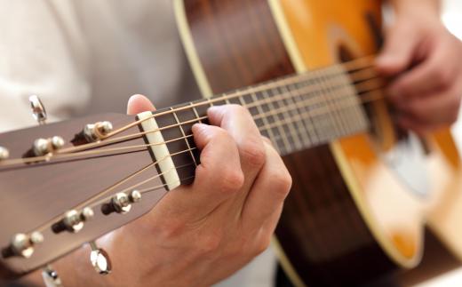 Humidity and string tension can cause a guitar's neck to bow.