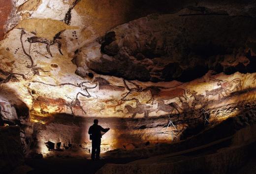 The earliest murals were painting by a population of prehistoric Homo sapiens called Cro-Magnons on cave walls.