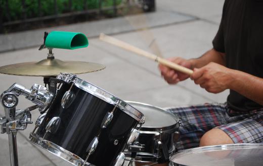 A drum kit is often featured in a rock orchestra.