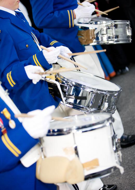 High school marching bands usually have matching uniforms.