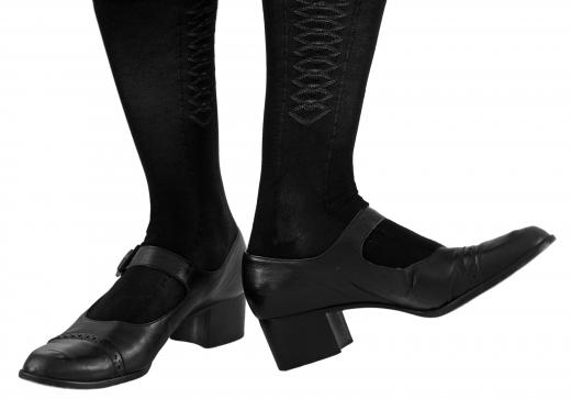 Tap dancers wear shoes with metal plates on the bottom.